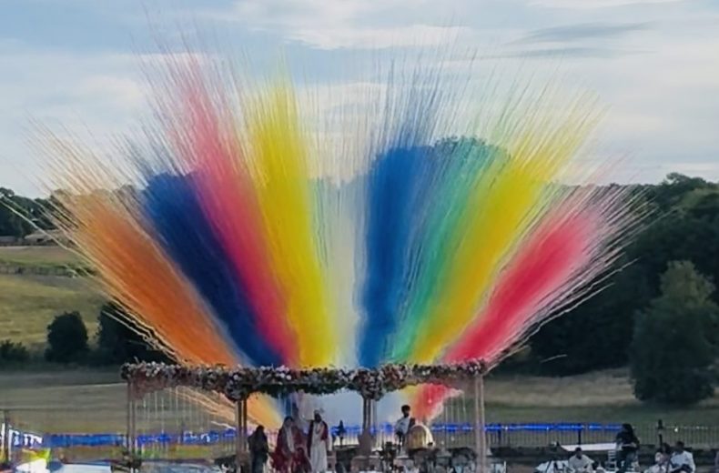 A vibrant burst of multicolored fireworks